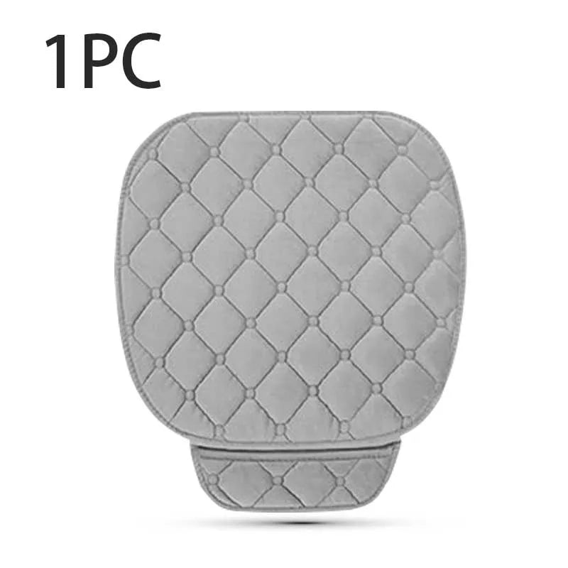 Gray quilted car seat cover on a white background