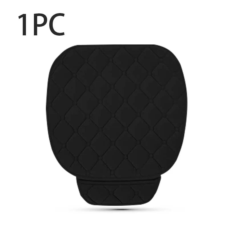 Black quilted car seat cover on a white background