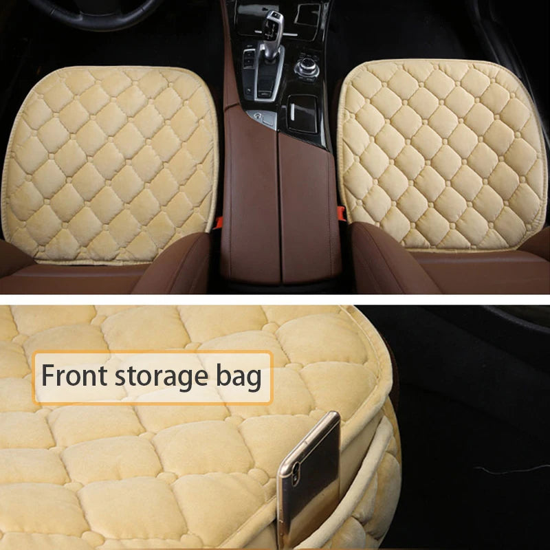 Beige quilted car seat covers with a front storage bag in a vehicle interior.