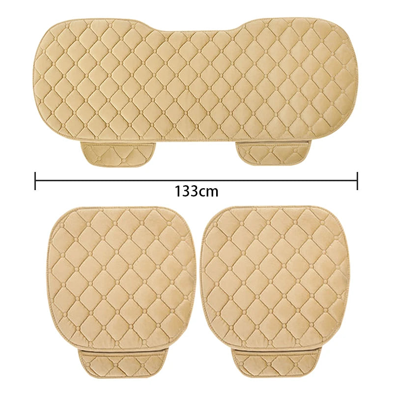 Beige quilted car seat cover set with dimensions on a white background