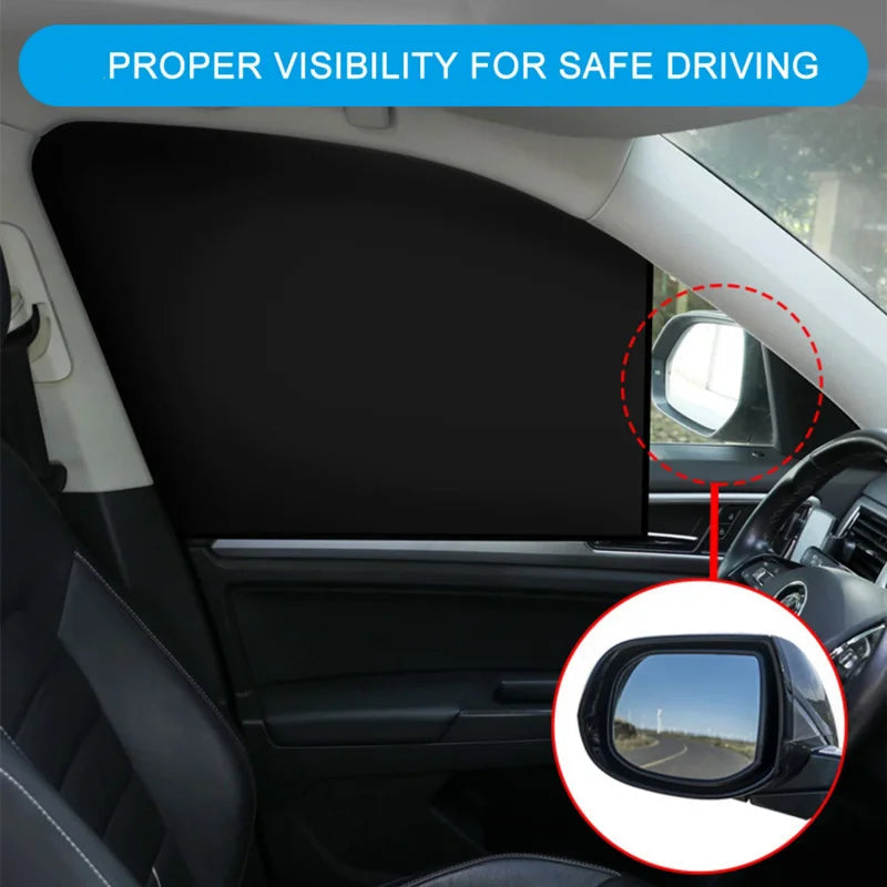 Car interior with a sunshade over the windshield and a side mirror showing reduced visibility.